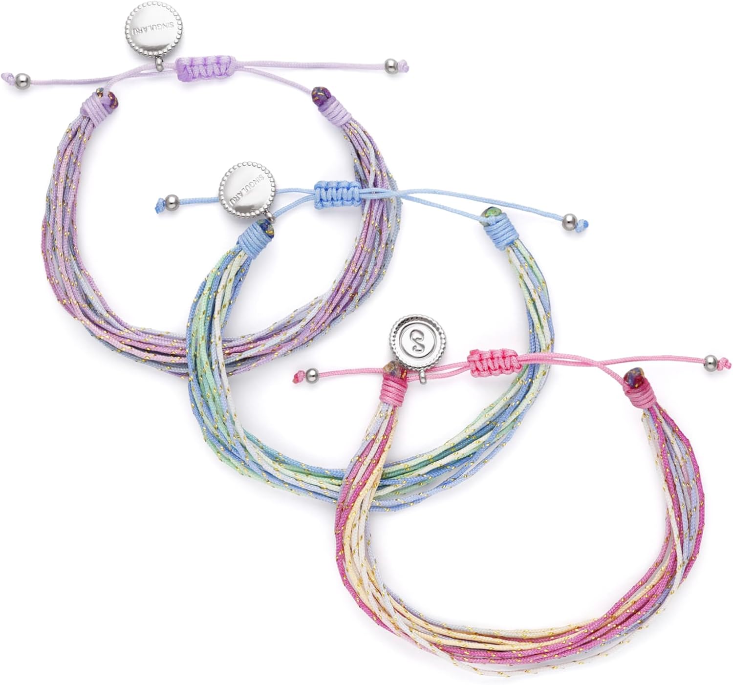 Detalle de SINGULARU Pack 3 Pulseras Sunset Spark: acero, cordón y color suave para llevar contigo