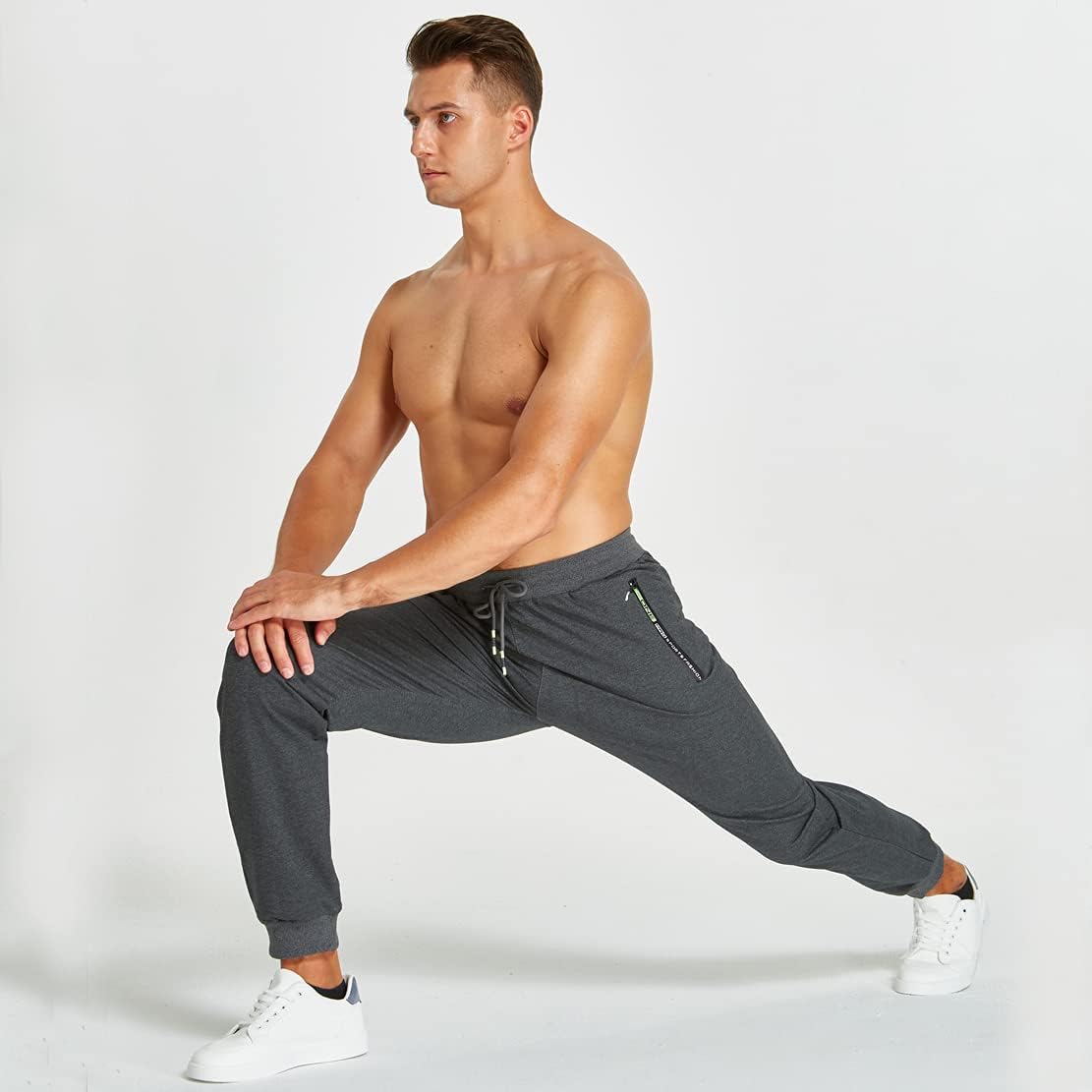 Detalle de ZOXOZ pantaloni sportivi uomo in cotone con elastico in vita e tasche con zip