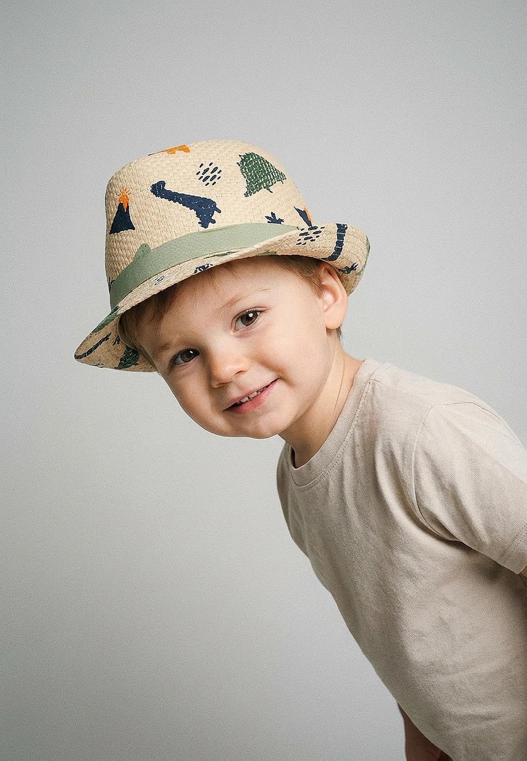 Detalle de Sterntaler Strohhut Dino – UV-Schutz 50+ Sonnenhut für Jungen mit Dino-Allover und Ripsband