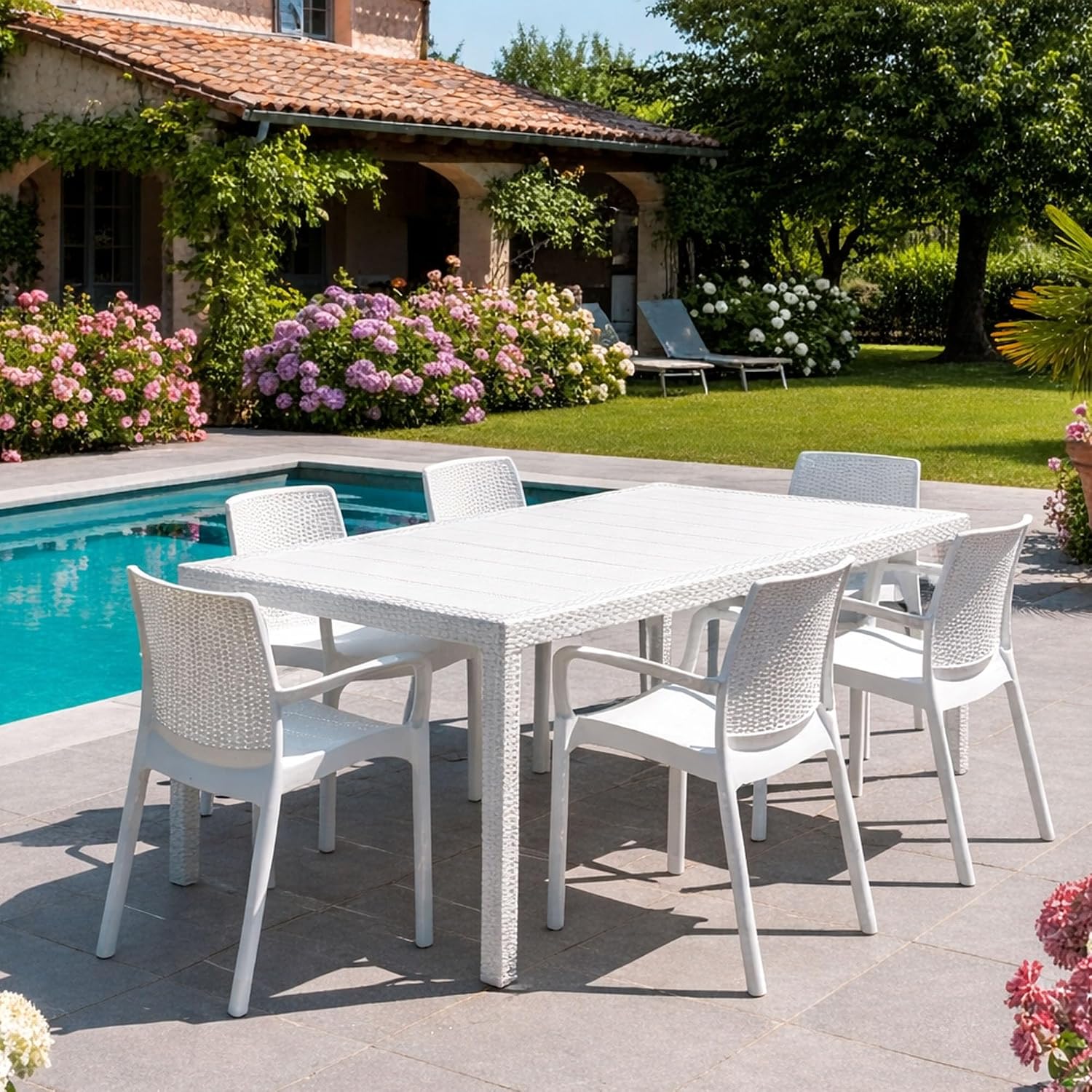 Detalle de Dmora Set Salotto da Esterno Manarola: tavolo allungabile con 4 sedie in stile rattan, 100% Made in Italy