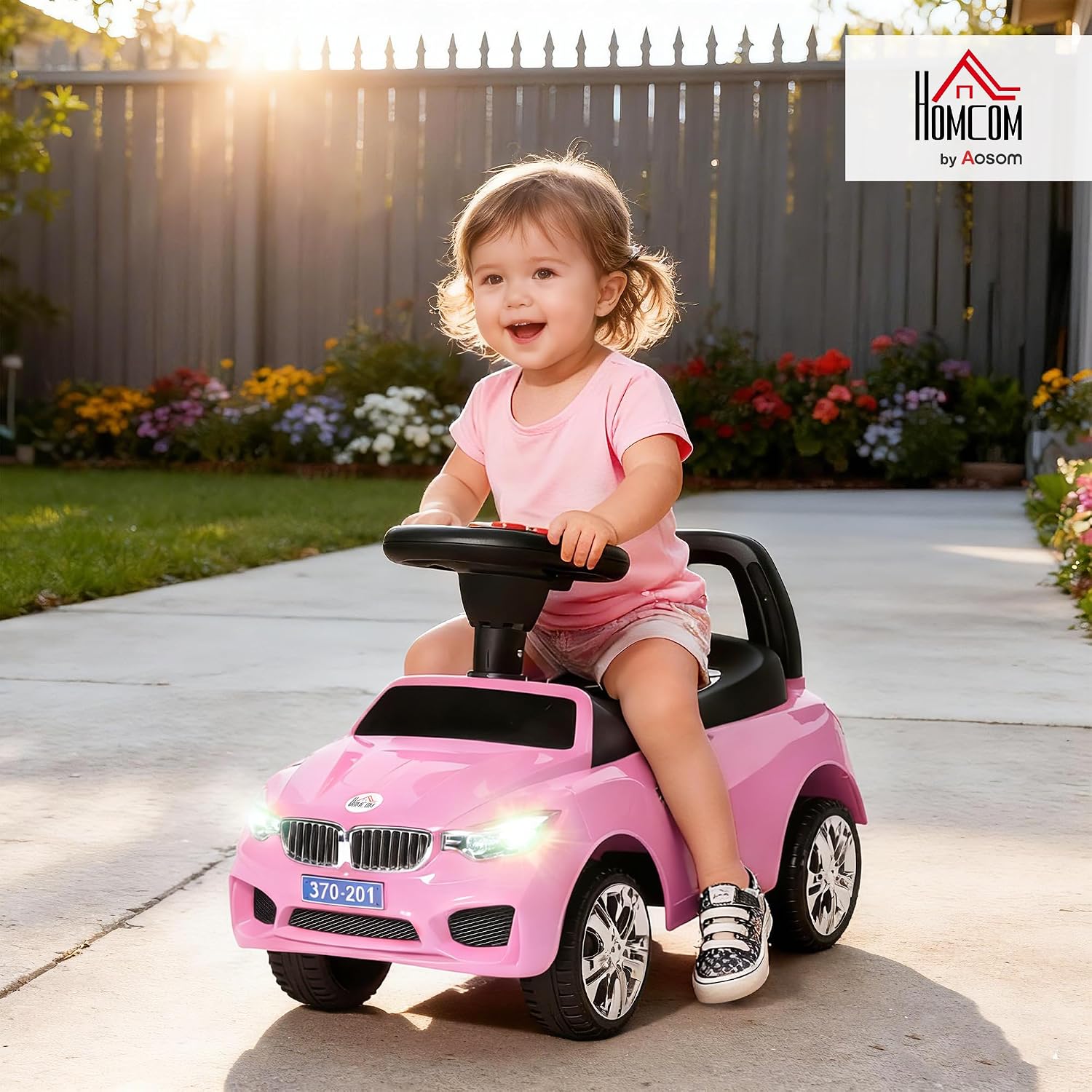 Detalle 2 de HOMCOM 370-201PK kinderauto met speelgoedkist, roze, claxon en muziek