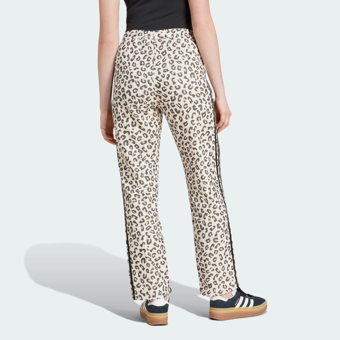 Thumbnail 1 de Pantalón Firebird Leopard de Adidas: estilo urbano en negro con estampado Leopard