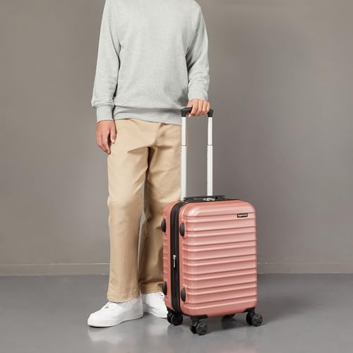 Detalle de Amazon Basics Hard Shell Small Suitcase (Rose Gold) – Expandable ABS Carry-On with 4 Double Spinner Wheels