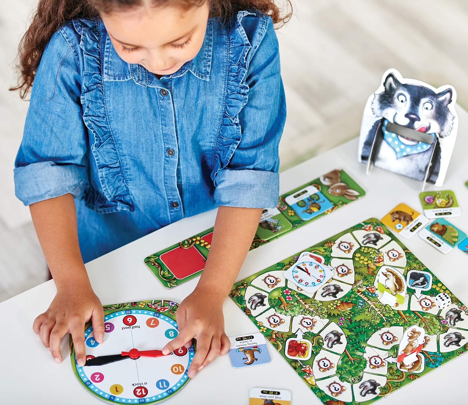 Detalle de Orchard Toys What's The Time, Mr Wolf? educatief bordspel met beweegbare klok