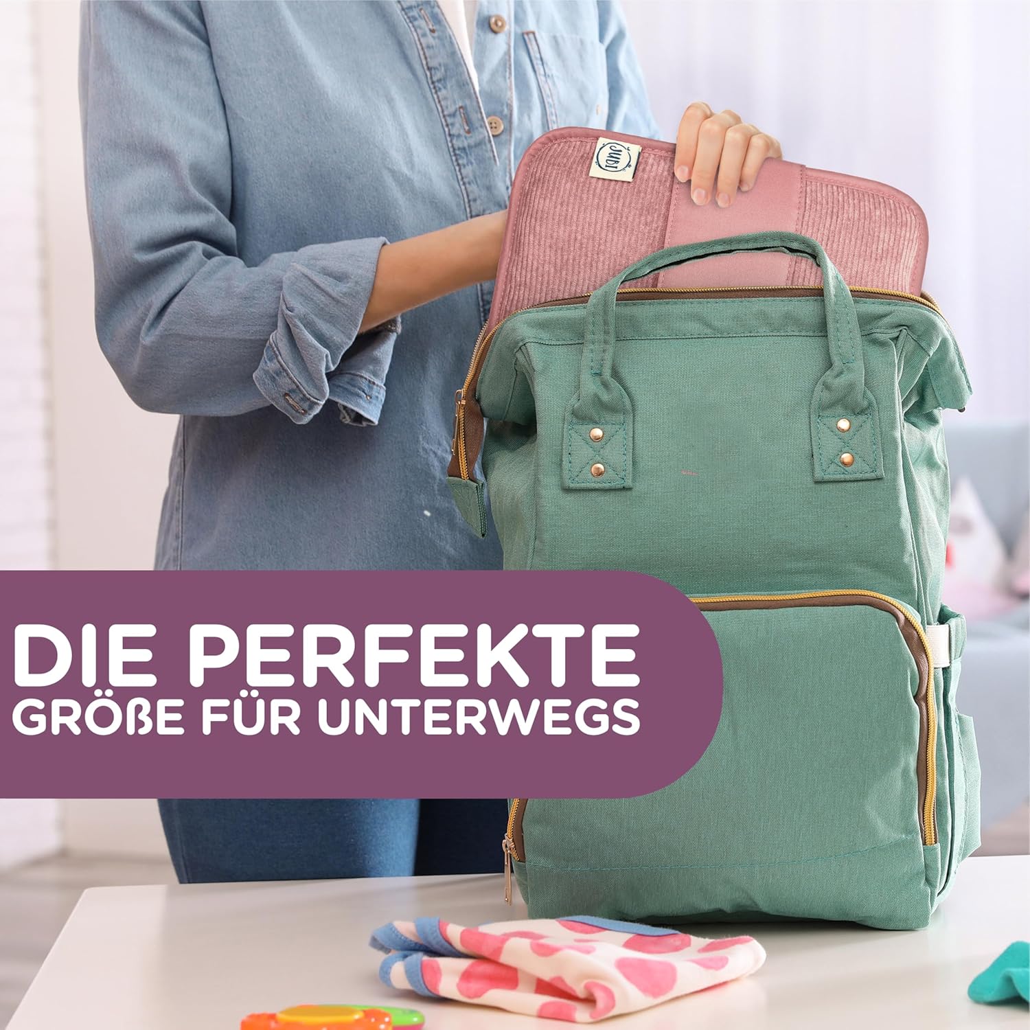 Detalle 2 de Jubi Windeltasche mit Wickelunterlage – Kompakte Begleiterin für unterwegs in Cord Pink (Klettverschluss)