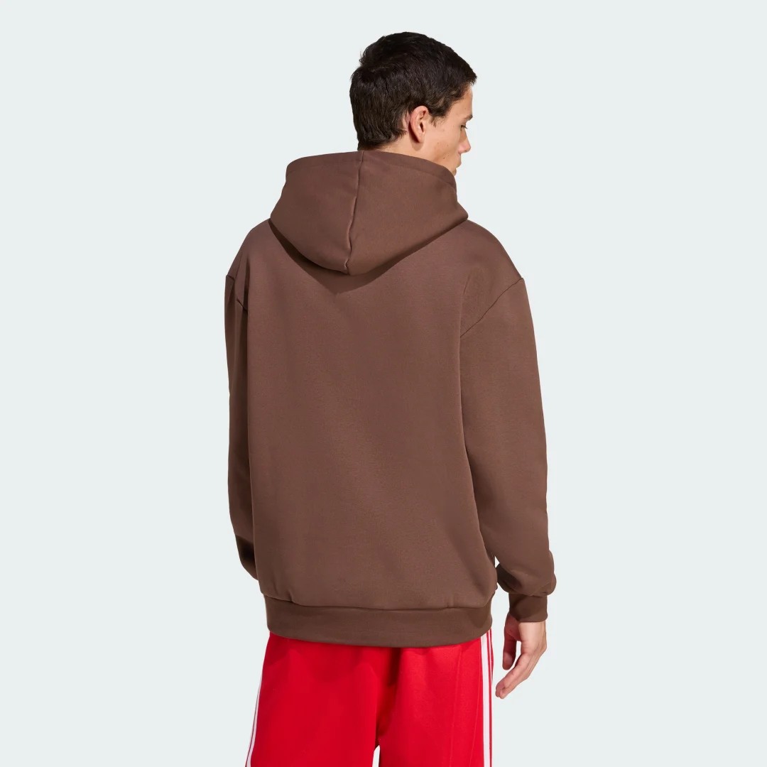 Detalle 2 de Sudadera estampada con capucha de Adidas: comodidad y estilo para el día a día