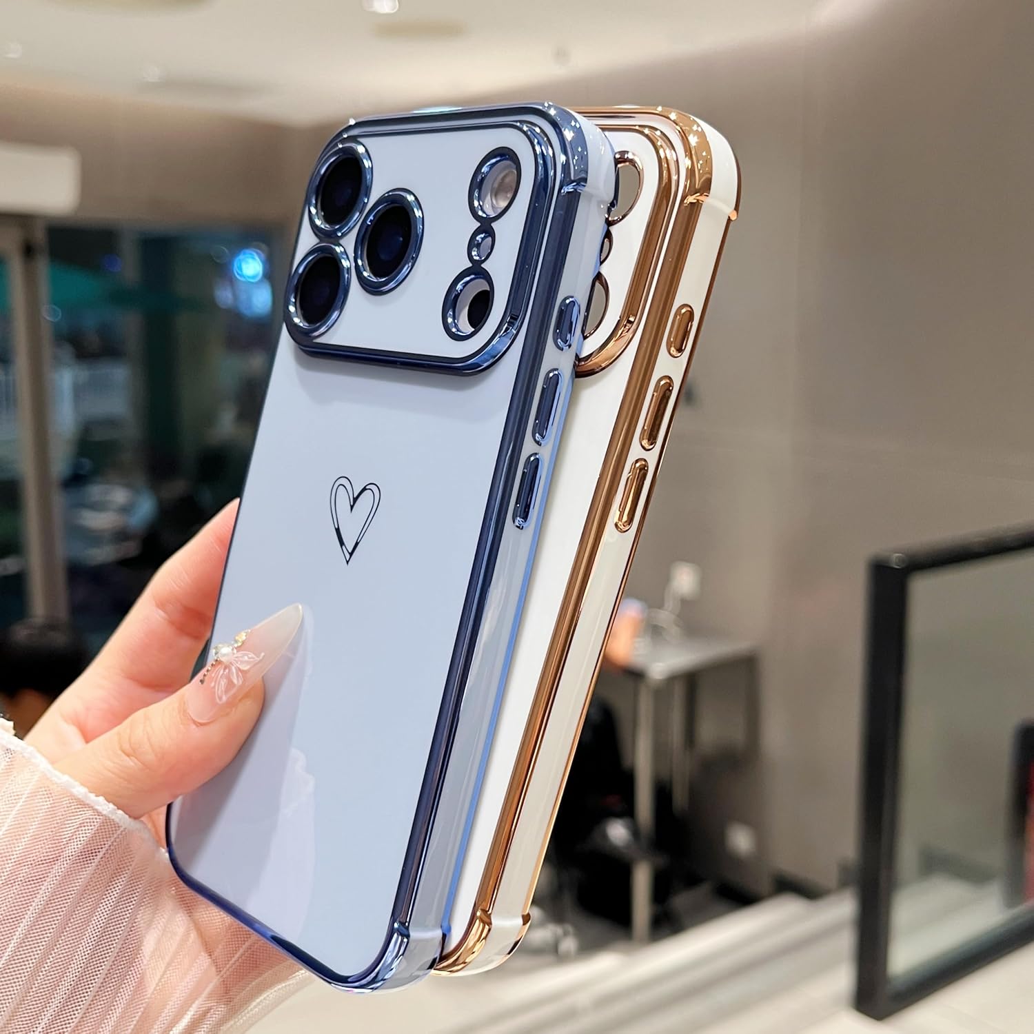 Detalle 2 de ZTOFERA Hülle iPhone 17 Pro 6,3 Zoll Herz Gold Rand