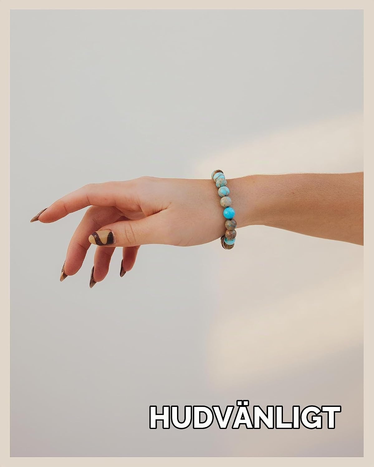 Detalle 2 de GOOD.designs chakraarmband i natursten med jaspispärlor på 8 mm