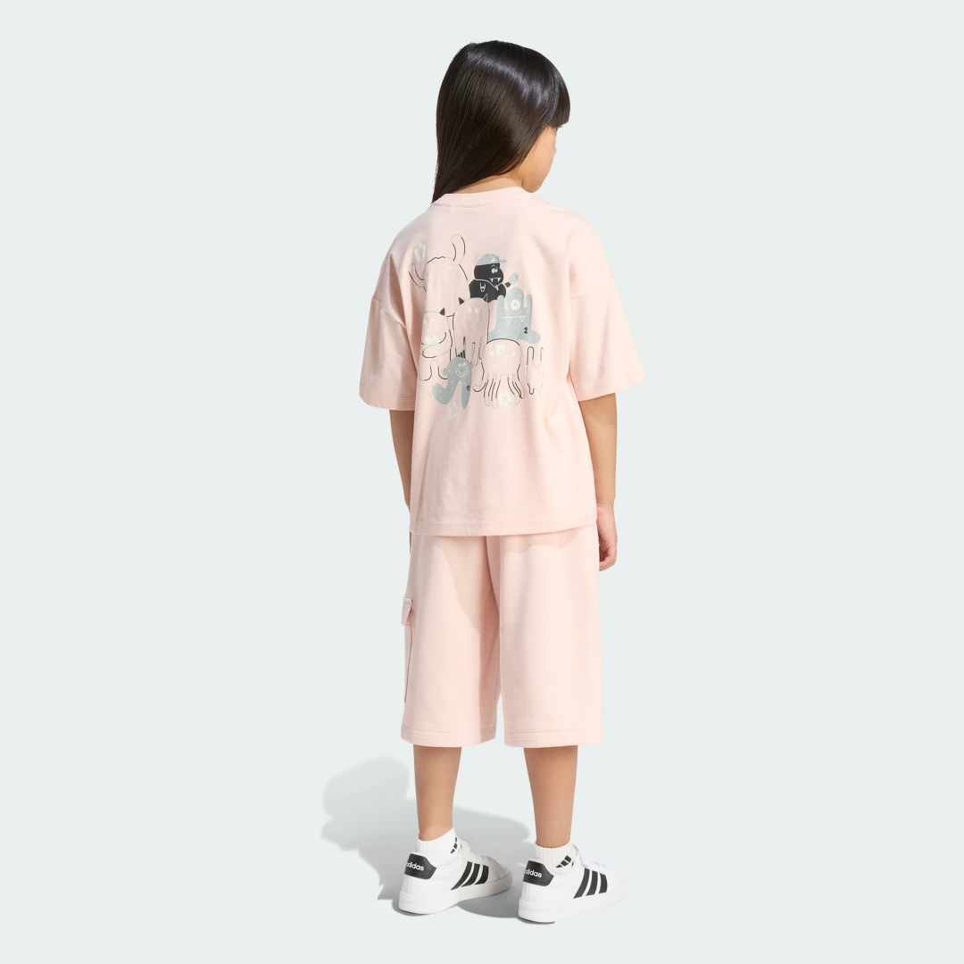Detalle 2 de Conjunto con camiseta TIRO_NSTER de Adidas — rosa, cómodo y práctico para entrenos