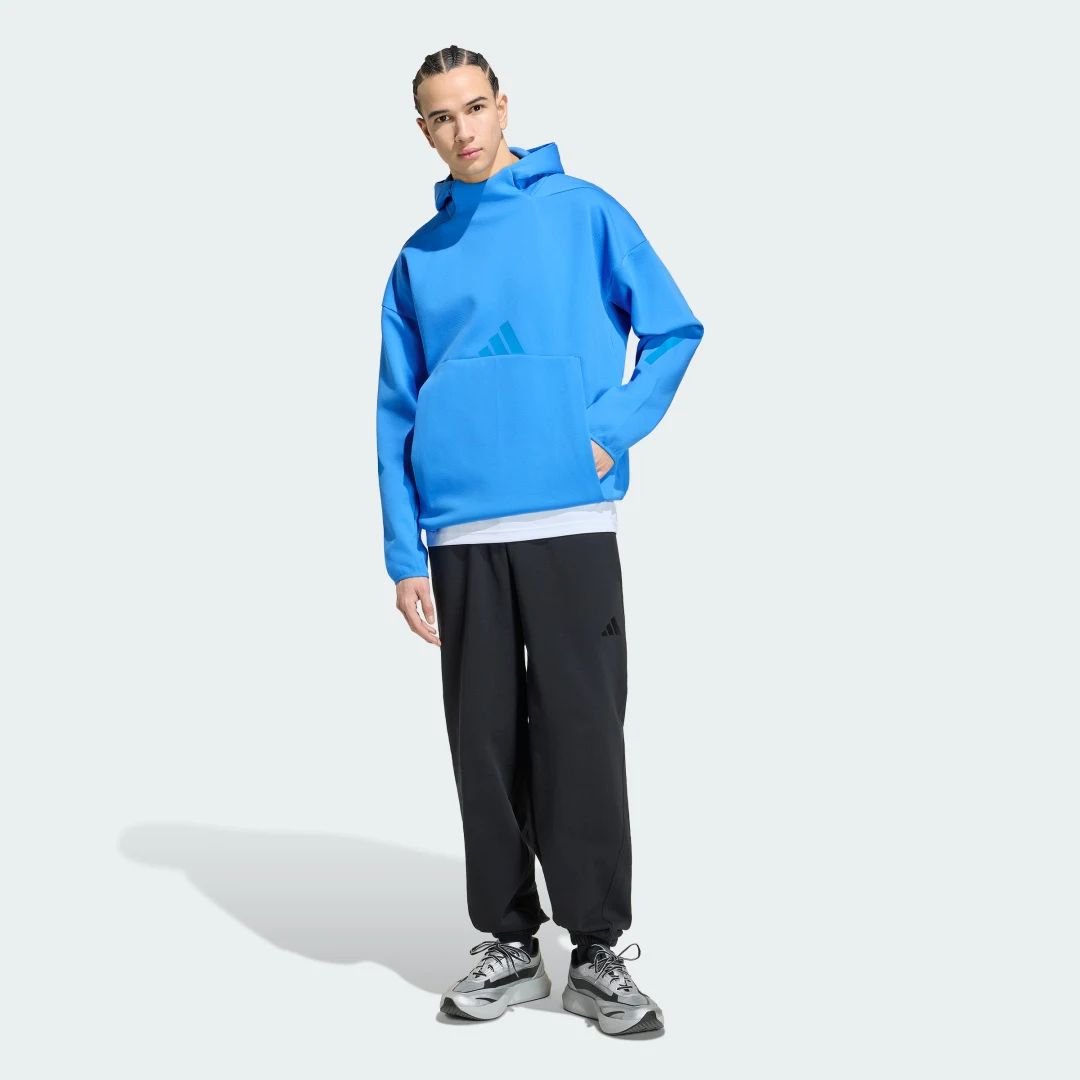 Detalle de Sudadera con capucha Z.N.E. de Adidas: comodidad en azul y estilo urbano