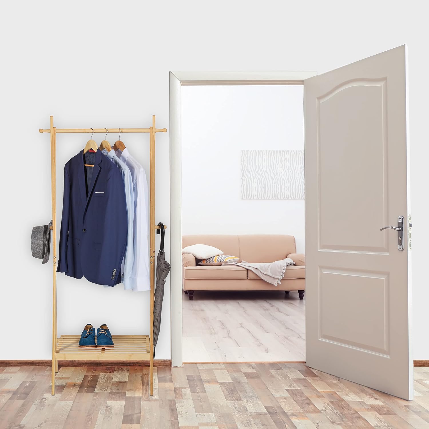 Detalle 1 de Relaxdays Bamboo Clothes Rack, foldable rail with shelf and 4 hooks, brown