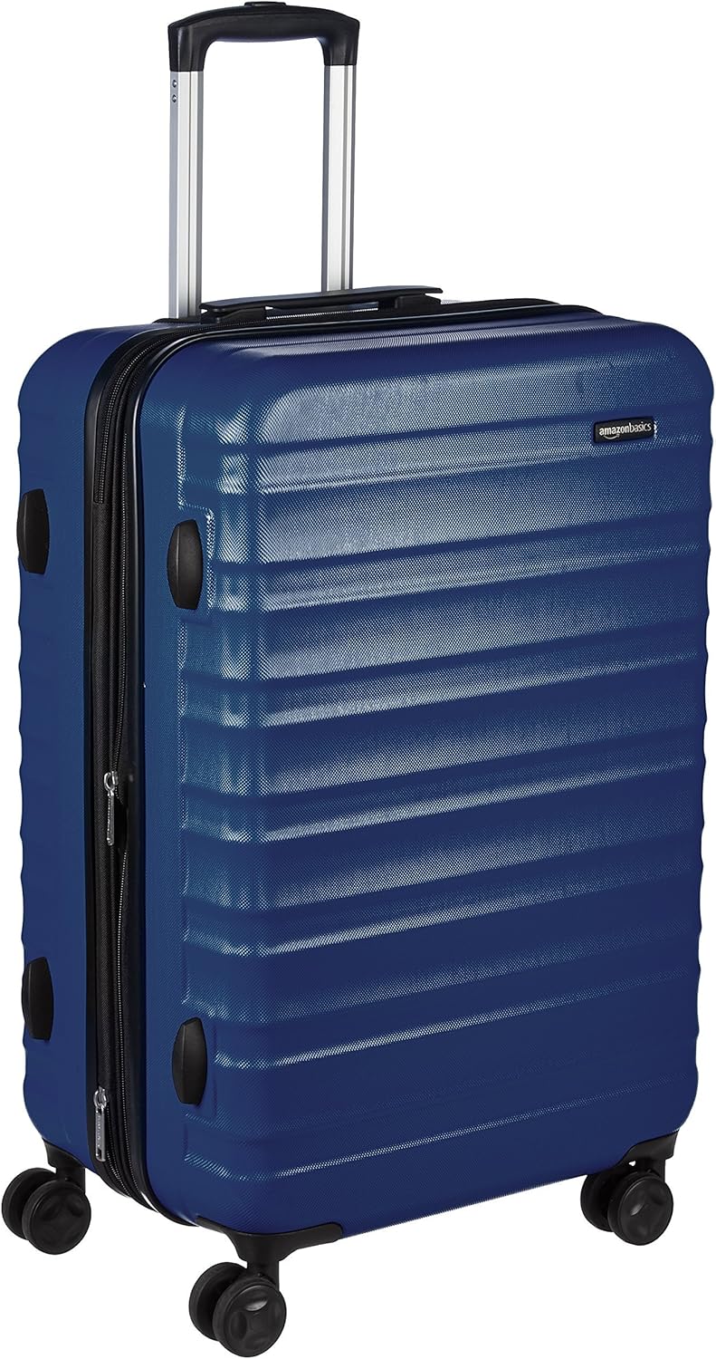 Detalle de Amazon Basics Hartschalen-Koffer Mittelgroß – Erweiterbares ABS-Reisegepäck, Marineblau, 65 l