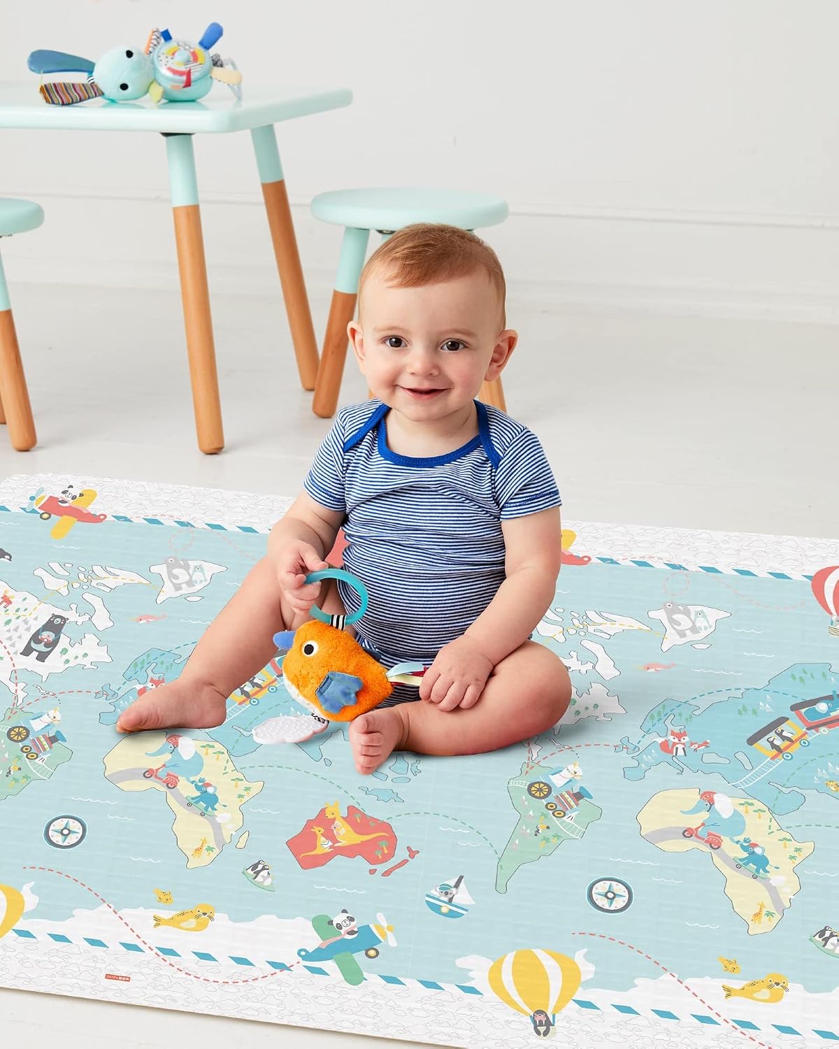 Detalle de Skip Hop Little Travellers omkeerbare speelmat, grijs, oprolbaar en waterdicht