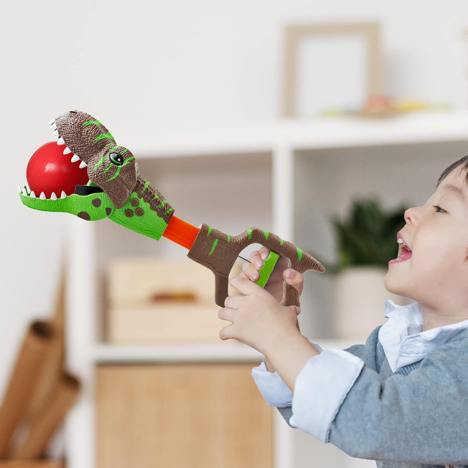 Detalle de DINOBROS Dinosaur Chomper Toys: 13.6-Inch Light & Sound T-Rex Reacher with 3 Roars