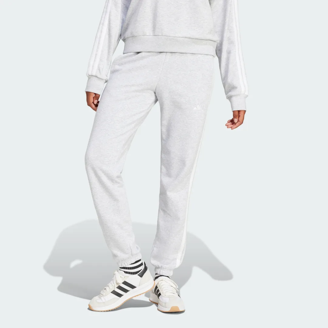 Detalle de Pantalón Essentials French Terry Cuffed 3 bandas de Adidas
