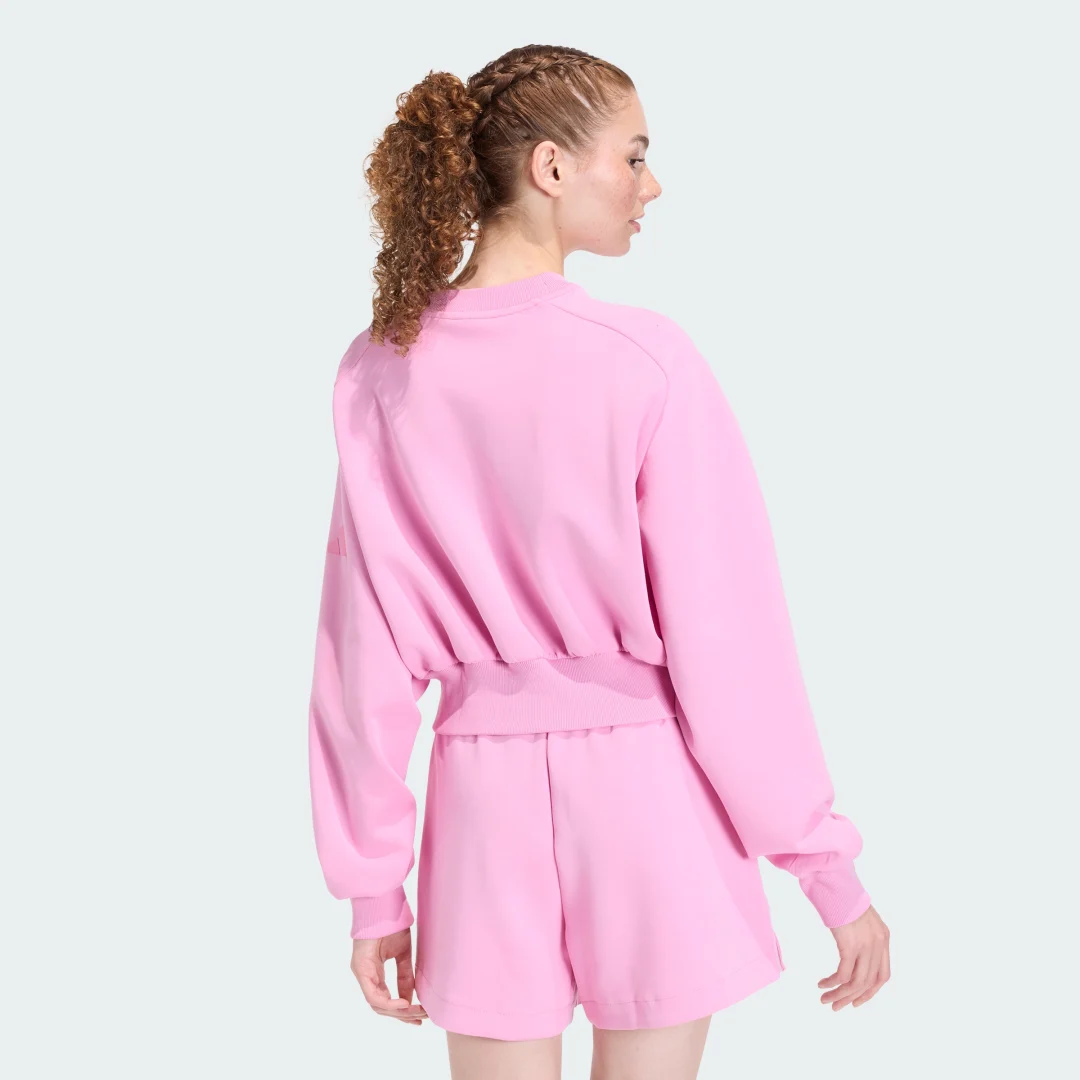 Detalle 2 de Sudadera holgada Soft Lux de Adidas: comodidad y estilo en rosa