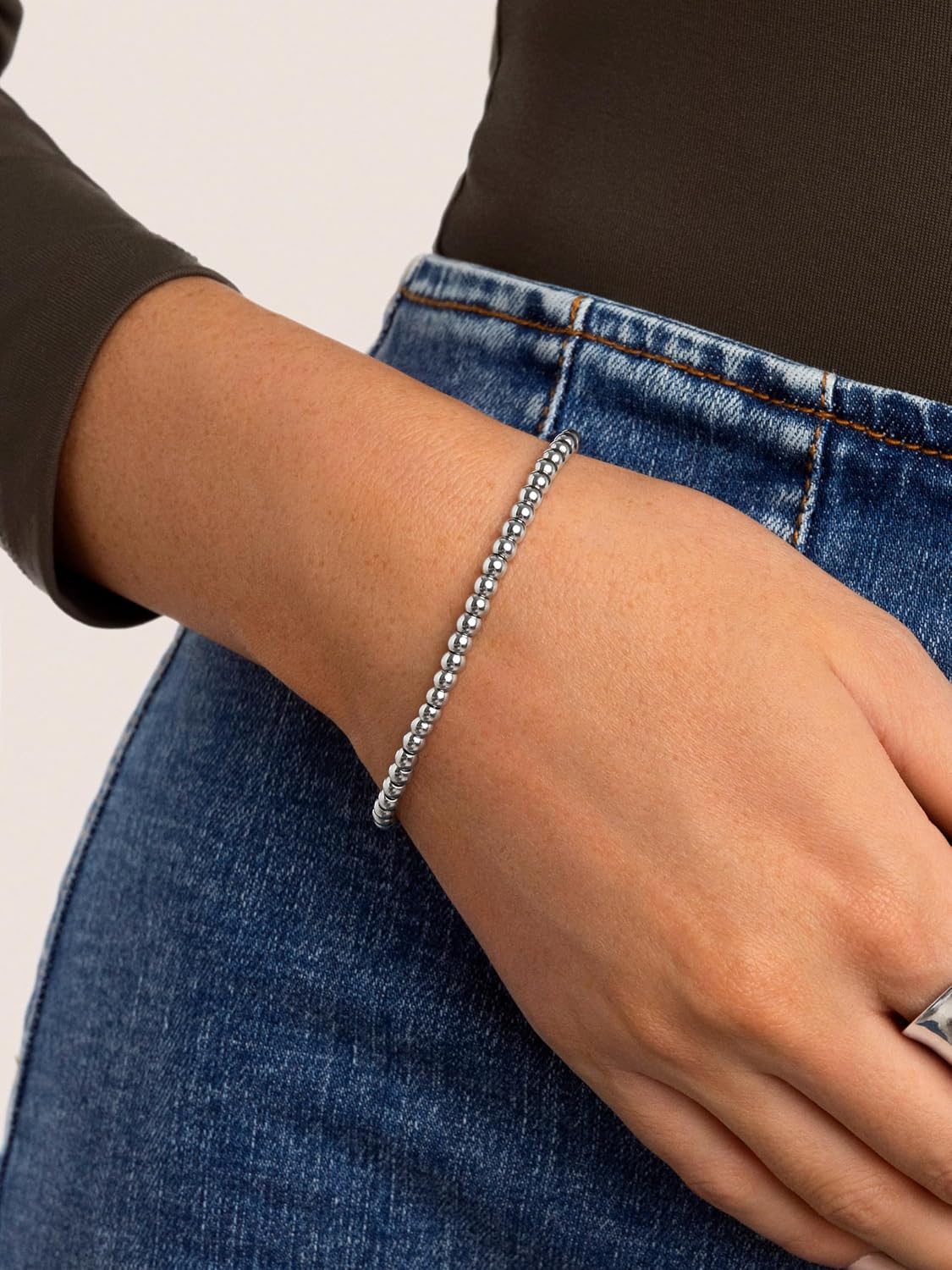 Detalle 2 de SINGULARU Pebbles L bracciale in acciaio con perline