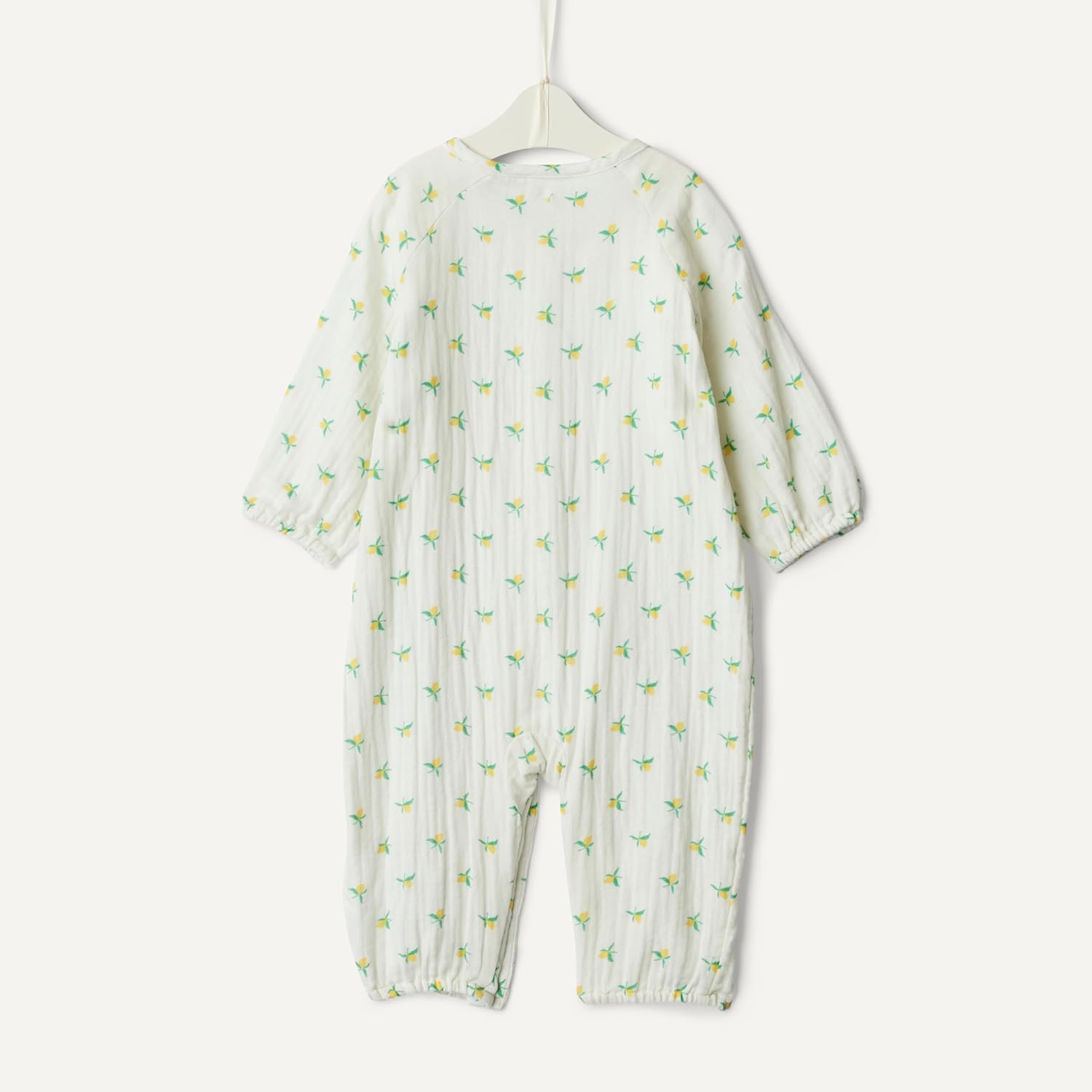 Detalle de Amazon Essentials x Sofia Grainge Unisex Baby Langärmeliger Strampler aus Baumwollgaze