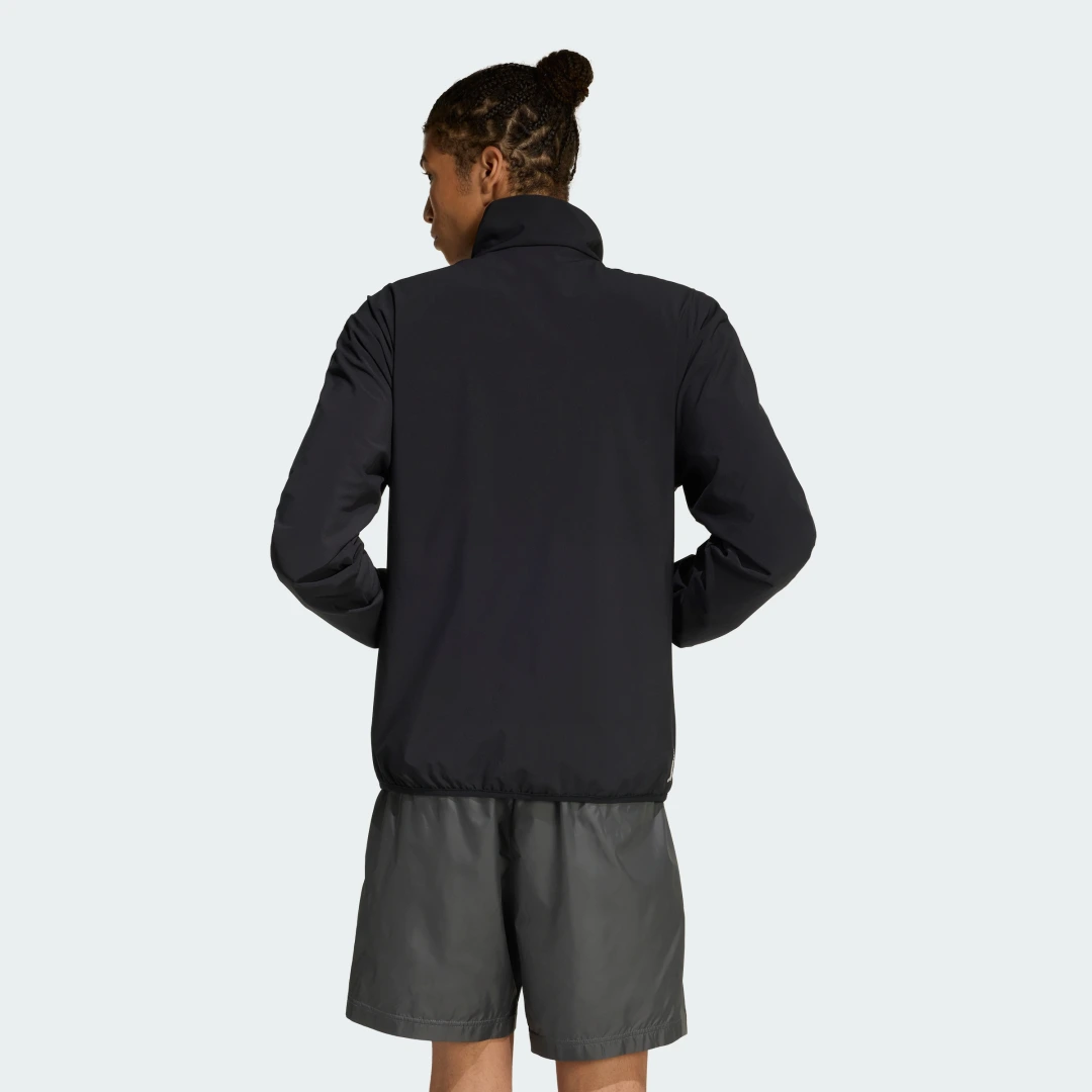 Detalle 2 de CHAQUETA DEPORTIVA HOUSE OF TIRO de Adidas en Negro — versátil para deporte y tiempo libre