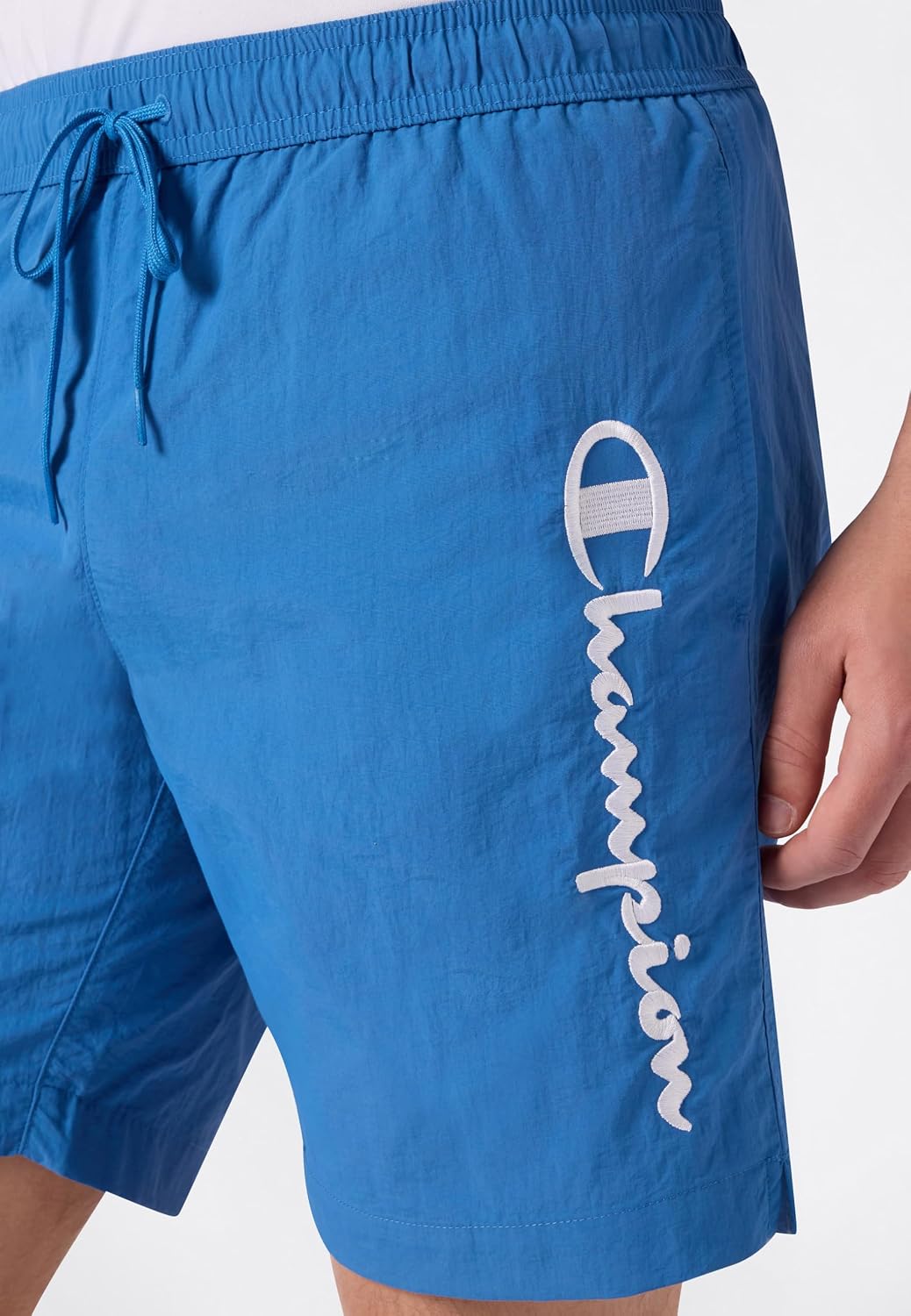 Detalle de Champion Beachshorts Costume a Pantaloncino da Uomo – logo Champion, lunghezza media e tasche laterali