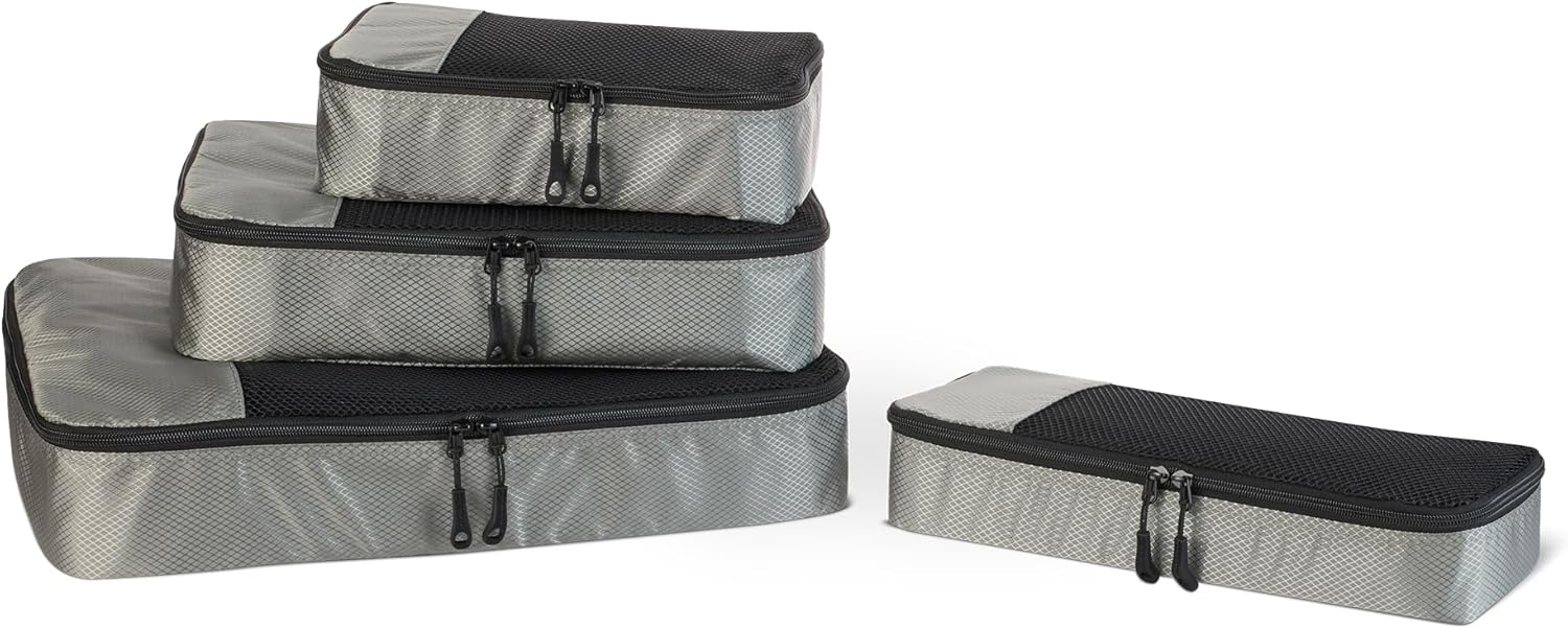 Detalle de Amazon Essentials juego de 4 cubos para viaje con doble cremallera y panel de malla (gris)