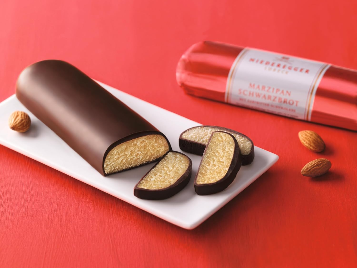 Thumbnail 1 de Niederegger Marzipan Schwarzbrot (125 g) – dunkles Marzipanbrot mit Mandel-Fokus