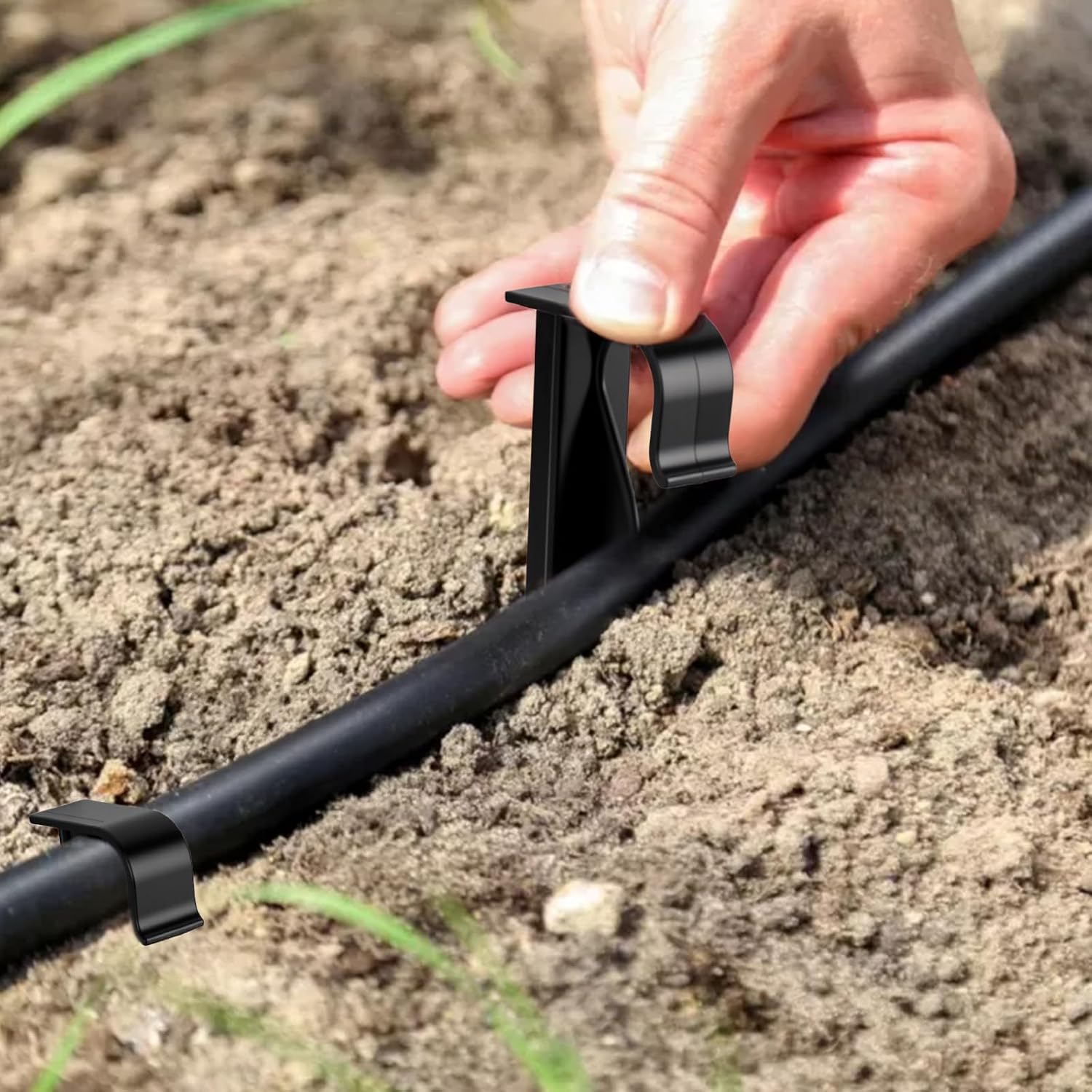 Detalle de Set di 50 picchetti per fissaggio tubi Ø 16 mm per irrigazione a goccia in polipropilene