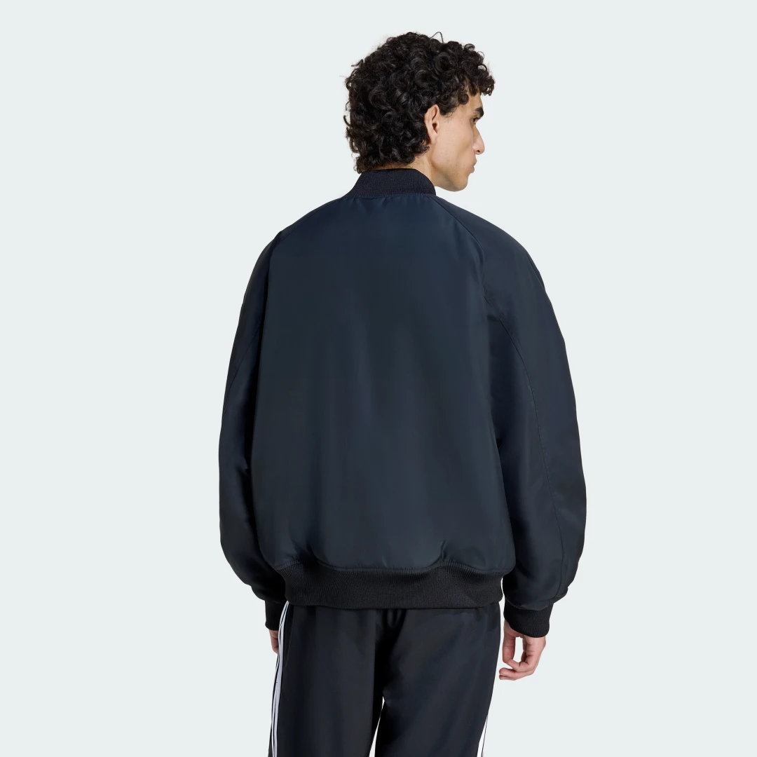 Thumbnail 1 de Chaqueta acolchada Teamgeist de Adidas: comodidad y estilo en negro