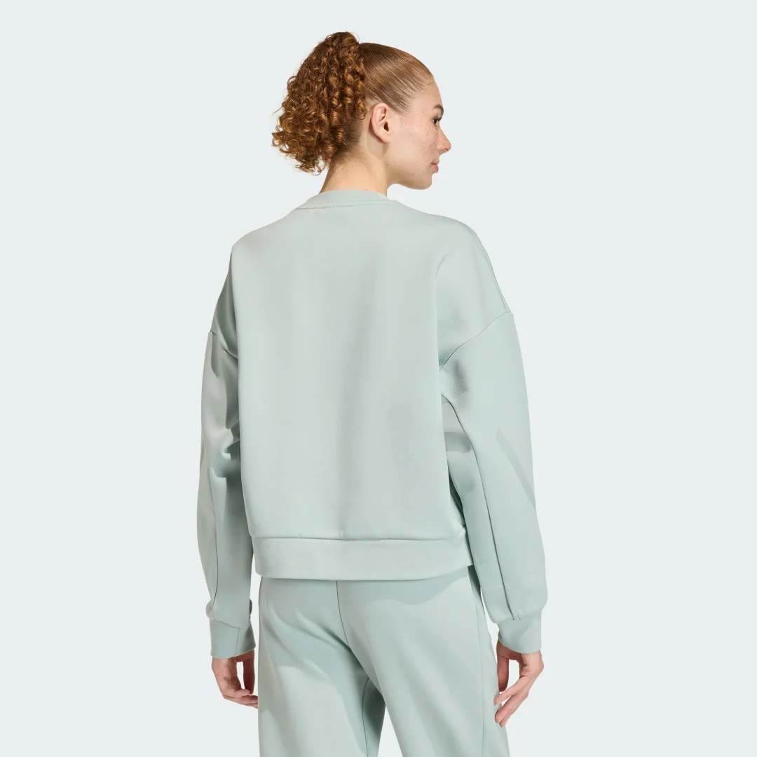 Detalle 2 de SUDADERA ADIDAS Z.N.E. Verde — confort y estilo urbano de Adidas