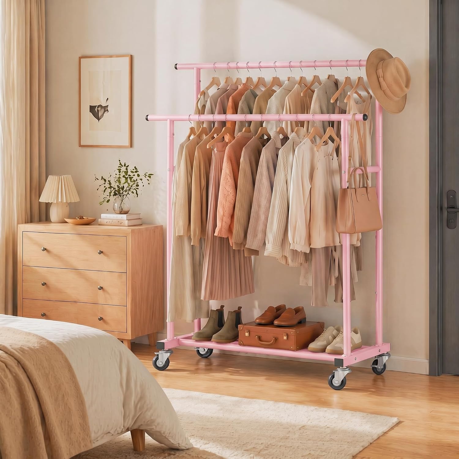 Detalle de Calmootey Rolling Garment Rack, Double-Rod Pink Metal Clothes Organizer