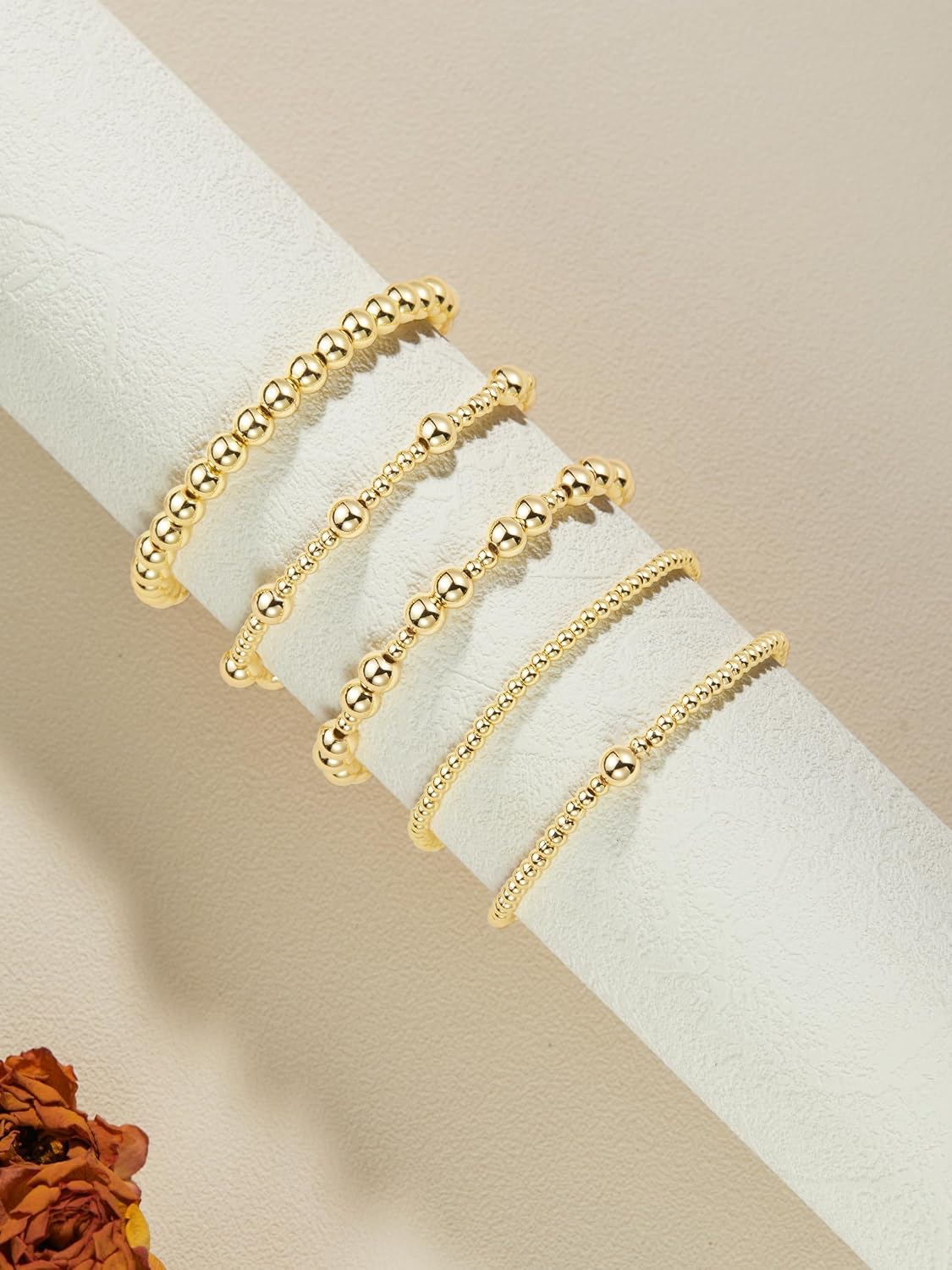 Detalle 2 de Sahoottie 5 Pcs Gold Beaded Bracelets for Women – Gold Plated, Stretch, Stackable