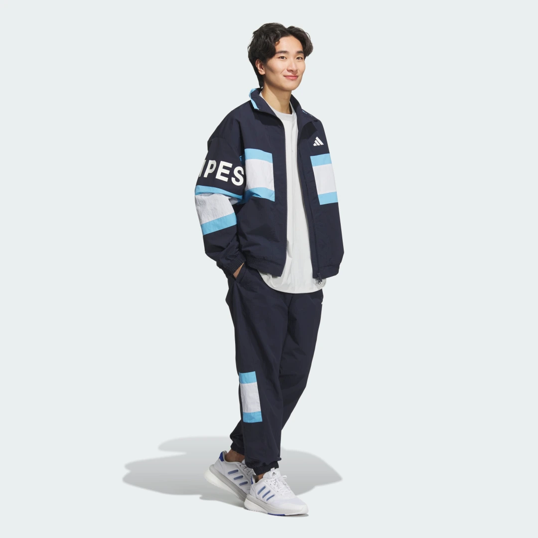 Thumbnail 2 de Wording Pack Loose Fit Mesh-Lined Woven Elastic Hem Joggers de Adidas — Joggers holgados con malla forrada en color Azul