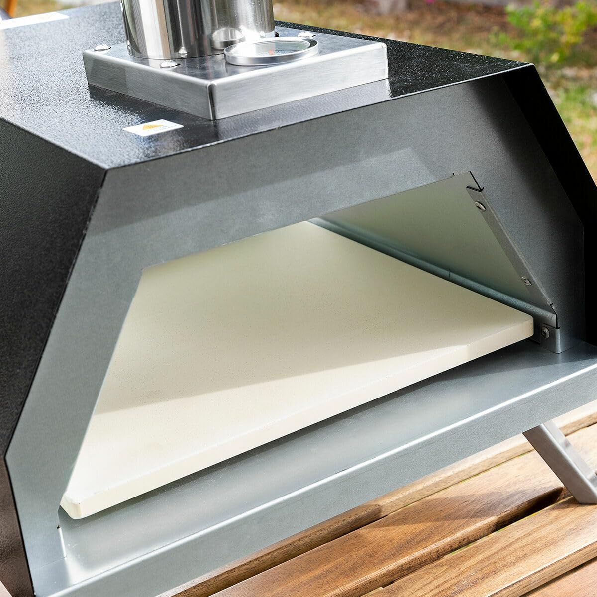 Detalle de InnovaGoods 8435527826215 pelletpizzaoven met keramische steen en thermometer