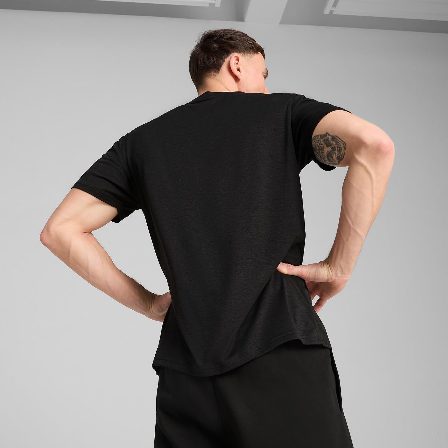 Detalle de PUMA Mens TAD Essentials Heather Cat Tee