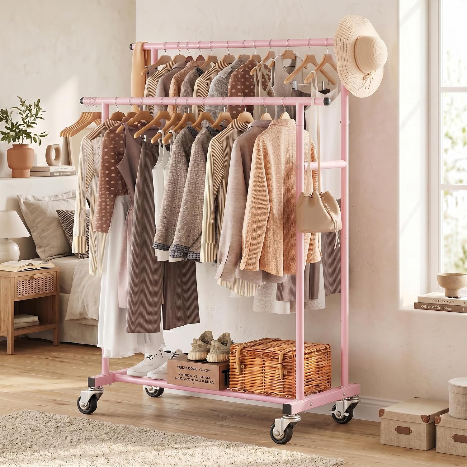Detalle de Calmootey Rolling Garment Rack, Double-Rod Pink Metal Clothes Organizer