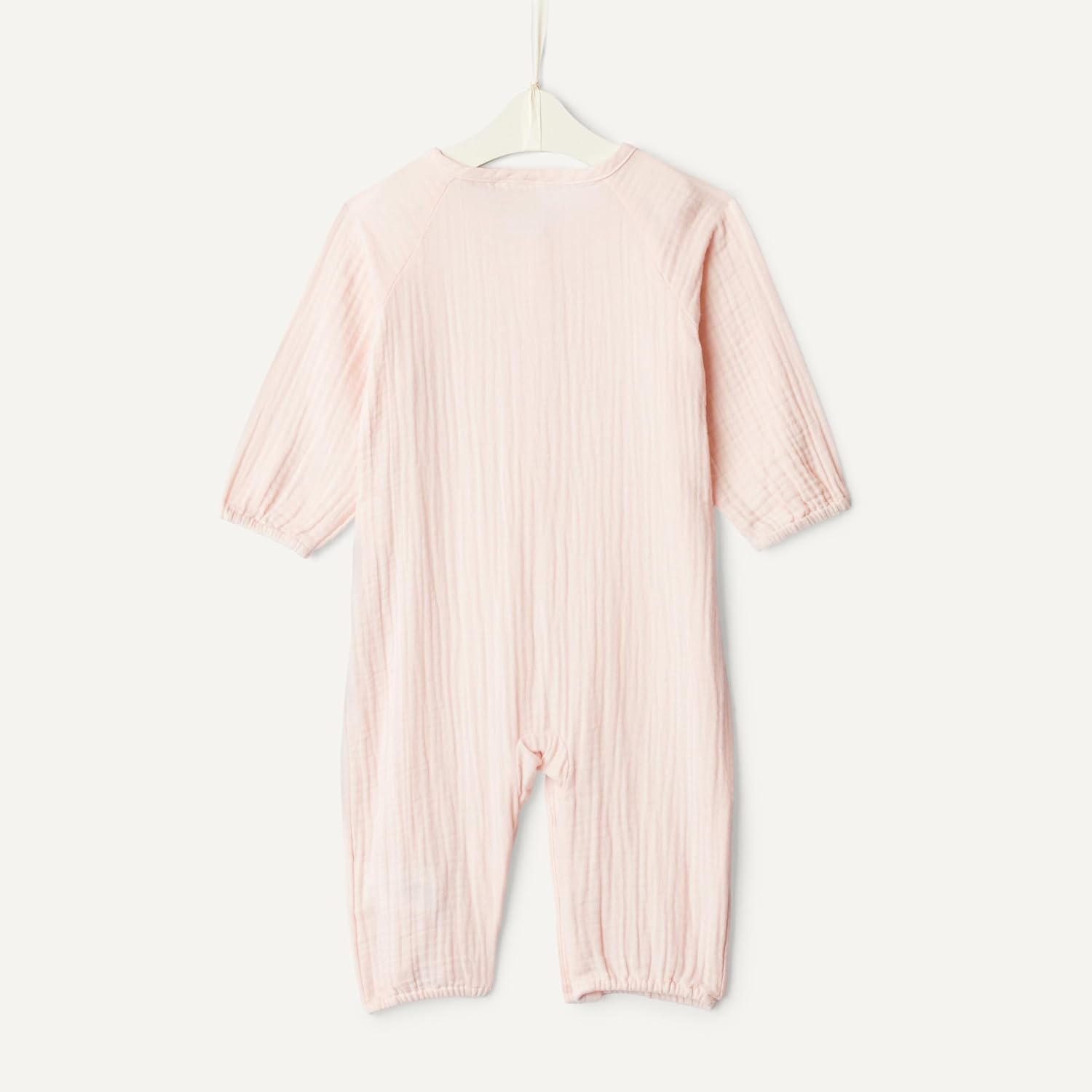 Detalle de Amazon Essentials x Sofia Grainge Unisex Baby Langärmeliger Strampler aus Baumwollgaze