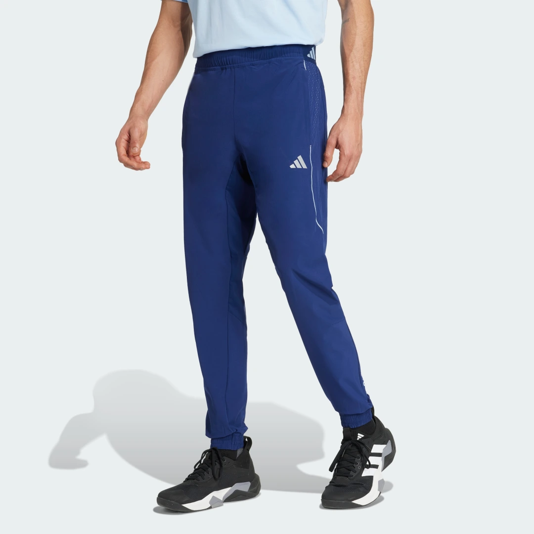 Detalle de Pantalón Tech Apparel de Adidas - comodidad y estilo en azul
