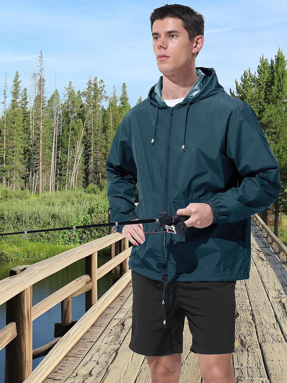Detalle de UIQUR Men's Rain Jacket: Waterproof, Windproof & Packable with Hood