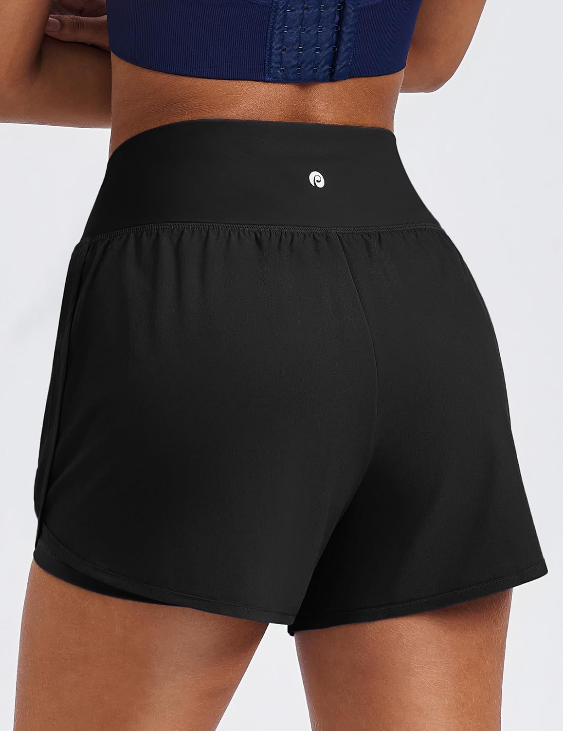 Detalle de PINSPARK Women's 2 in 1 High Waisted Athletic Running Shorts 3" Dolphin Hem