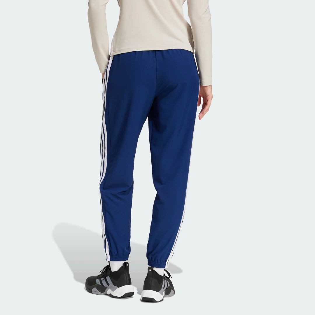 Thumbnail 1 de Adidas Train Essentials Woven 3 bandas pantalón azul