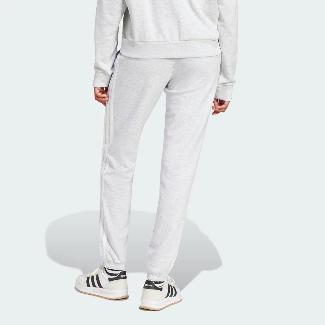 Detalle 2 de Pantalón Essentials French Terry Cuffed 3 bandas de Adidas