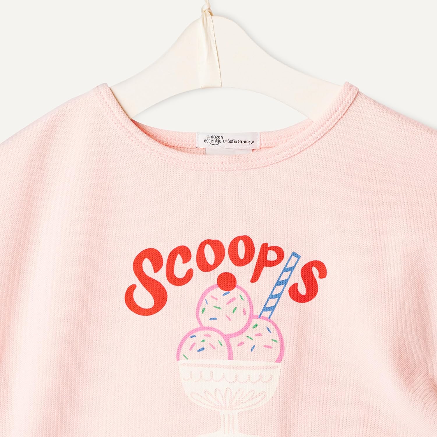 Detalle de Amazon Essentials x Sofia Grainge Toddlers and Baby Girls' Cotton Pique Short-Sleeve T-Shirt & Trousers Play Set