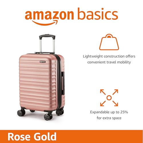 Detalle de Amazon Basics Hard Shell Small Suitcase (Rose Gold) – Expandable ABS Carry-On with 4 Double Spinner Wheels