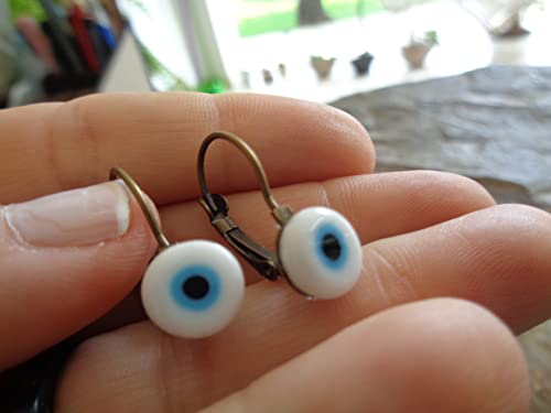 Detalle de Orecchini Evil Eye in bronzo con cabochon e perla - Asai Bolivien Ethno Tribal