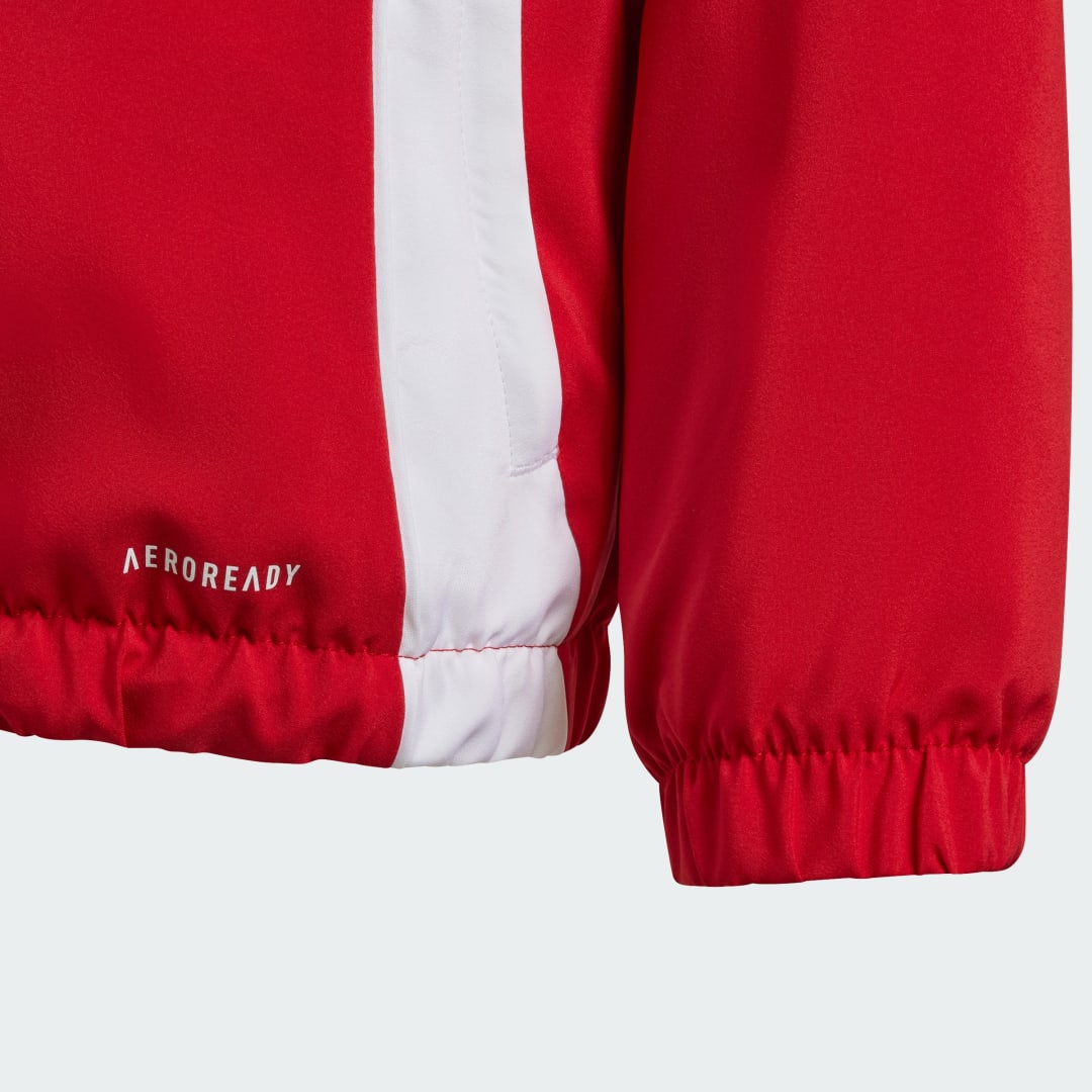 Detalle de Cortavientos Tiro 24 (Adolescentes) de Adidas — rojo, para temporada de entretiempo