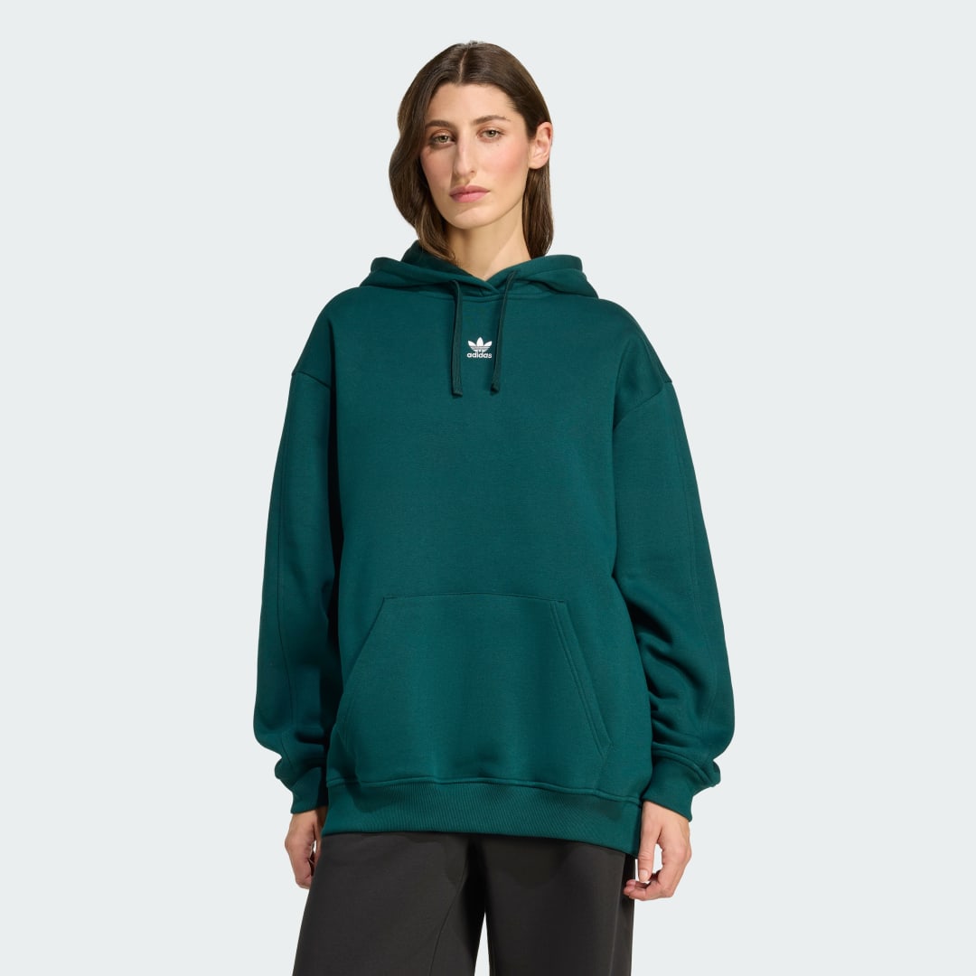 Detalle de Sudadera con capucha Essentials Oversized Fleece de Adidas (Verde): comodidad casual para tu día a día