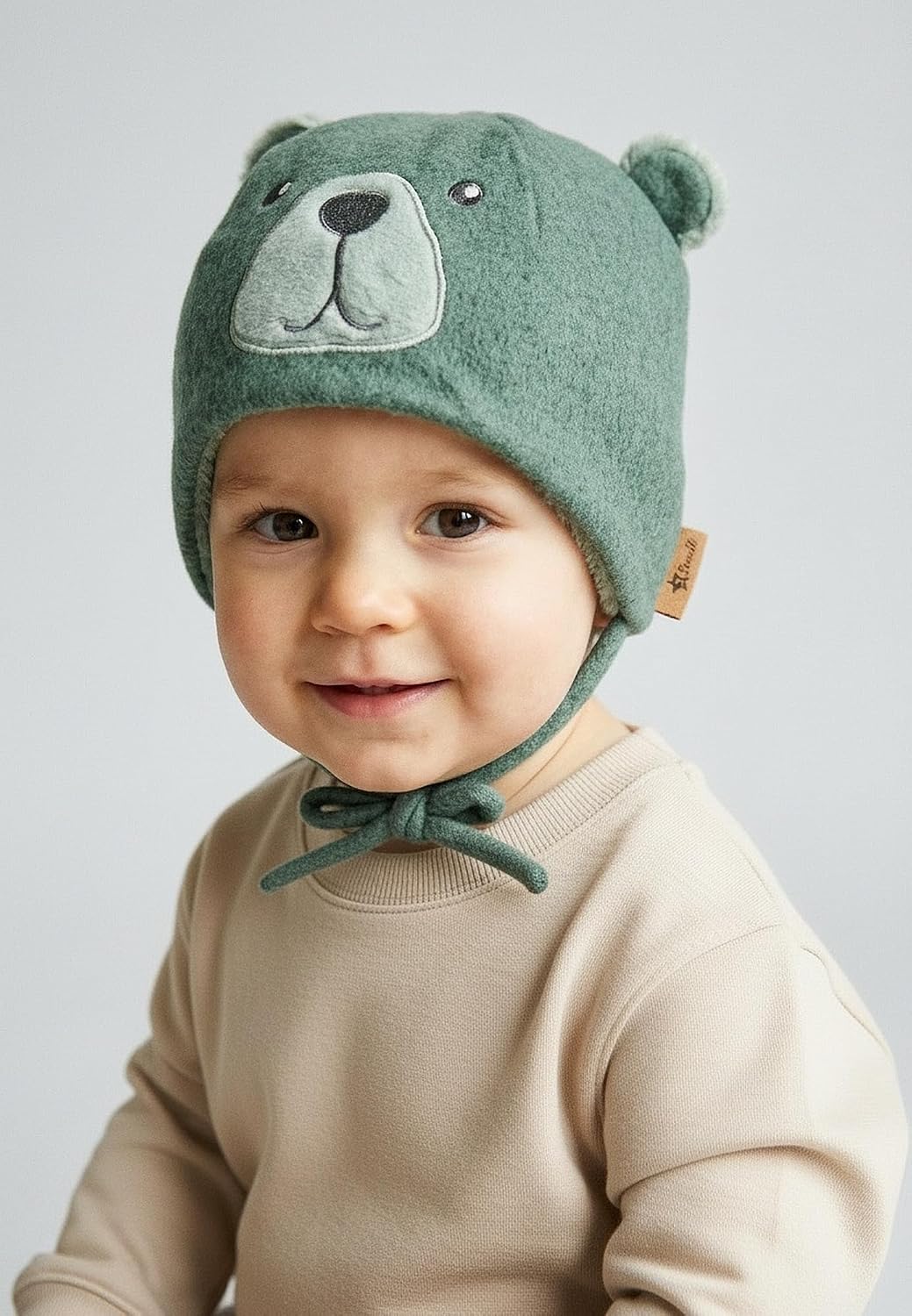 Detalle de Sterntaler Jungen Beanie-Mütze Bär – grün meliert, Größe 45