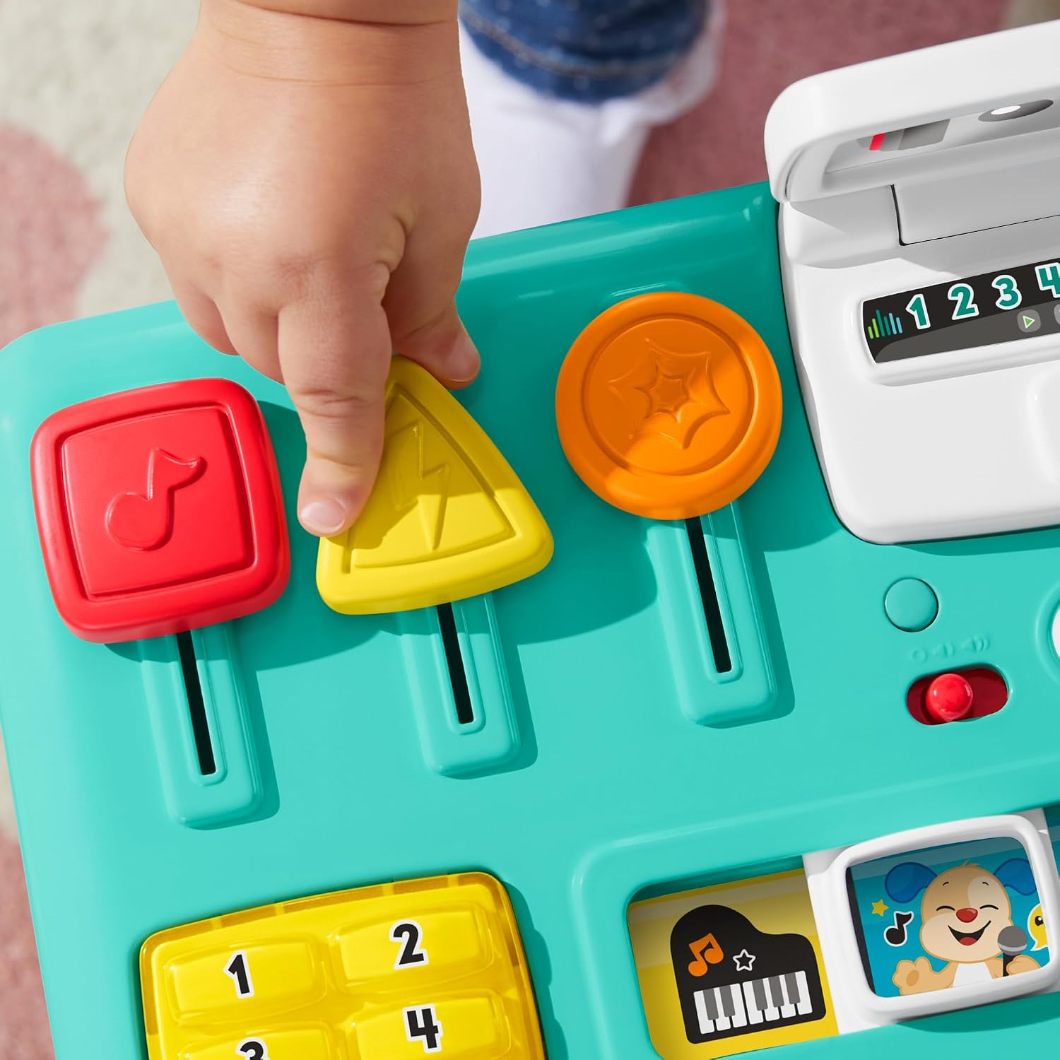 Detalle 1 de Fisher-Price HXG09 – muzyczny stół DJ z 3 trybami, światłami i 12 aktywnościami