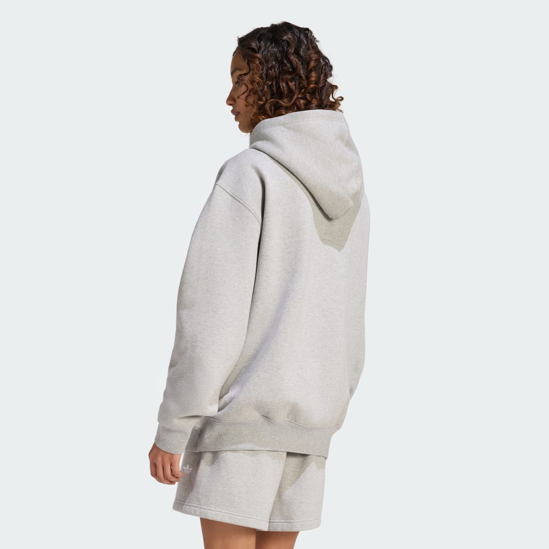 Detalle 2 de SUDADERA CON CAPUCHA DE FELPA Y CORTE HOLGADO ESSENTIALS de Adidas – comodidad casual en gris