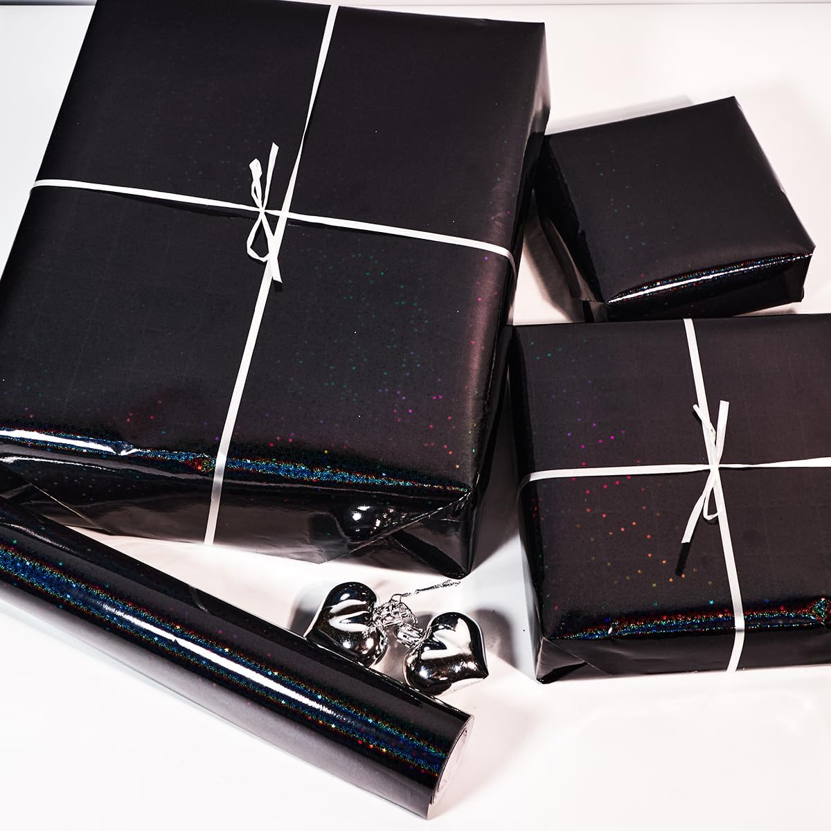 Detalle de Black Holographic Wrapping Paper Roll, 43cm x 10m – Black Metallic Gift Wrap with Shiny Stars